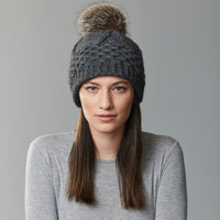 TUQUE À GROSSES TORSADES TRICOTÉES ET POMPON EN FOURRURE RECYCLÉE